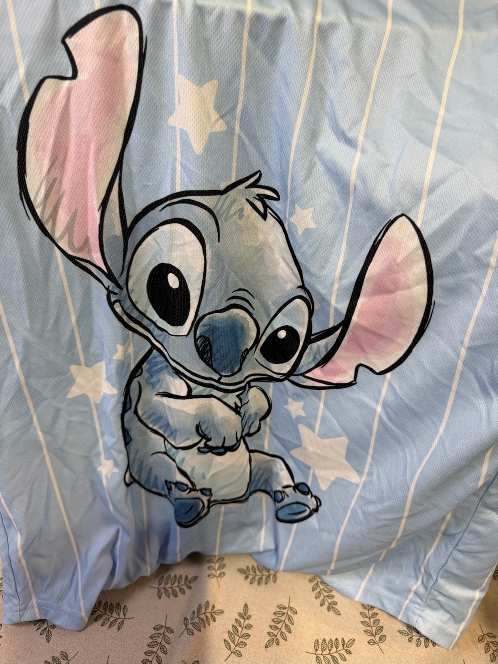 Disney Light Blue Stitch Graphic Shirt with Pink Ear Accents